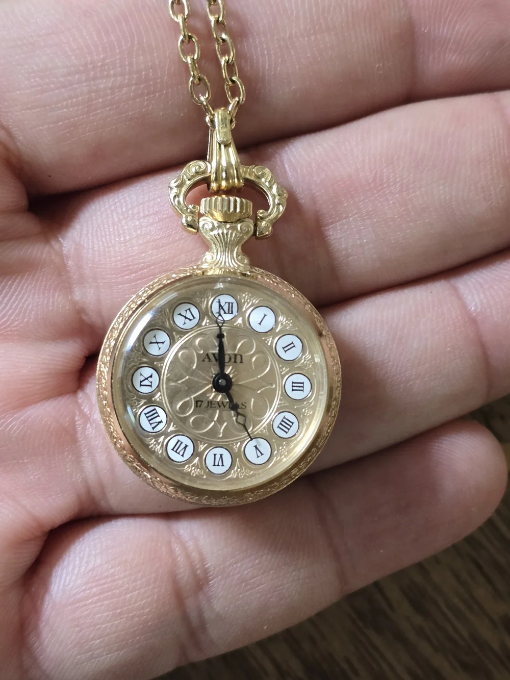 Avon Gold Pocket Watch Pendant Necklace with White Dial Accents